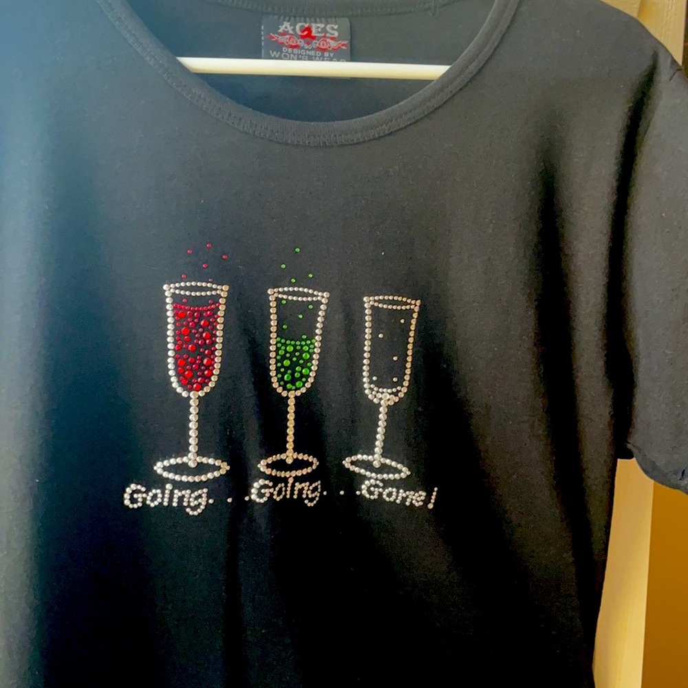 Aces brand size L & XL Rhinestoned T-shirts. Reads: “Going…Going…Gone!”
